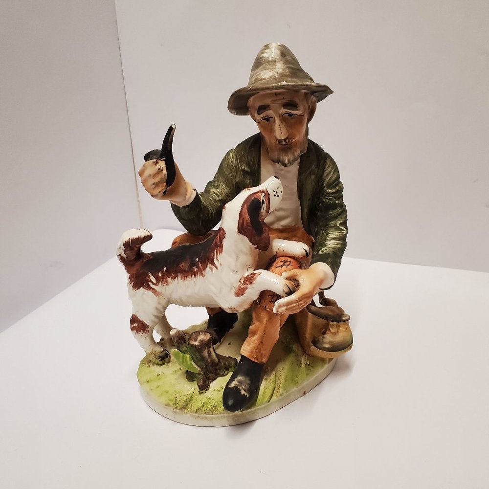 Vintage Norleans Ceramic Man with Dog figurine